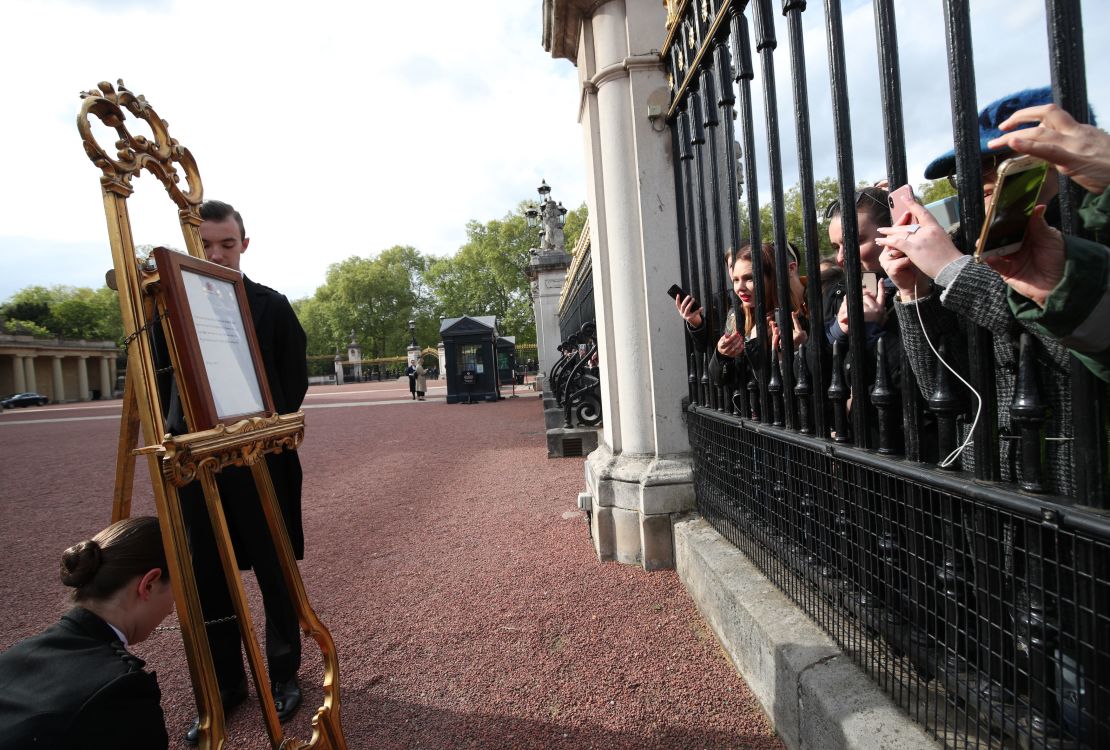 The official notice of the birth of a baby boy to the Duke and Duchess of Sussex is put on display outside Buckingham Palace on Monday. 