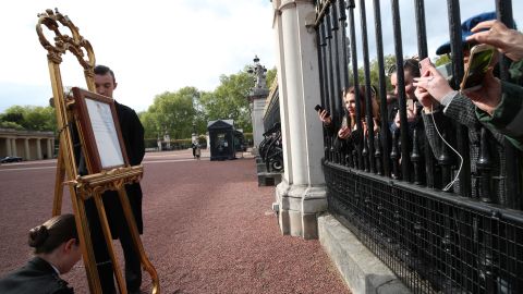 The official notice of the birth of a baby boy to the Duke and Duchess of Sussex is put on display outside Buckingham Palace on Monday. 