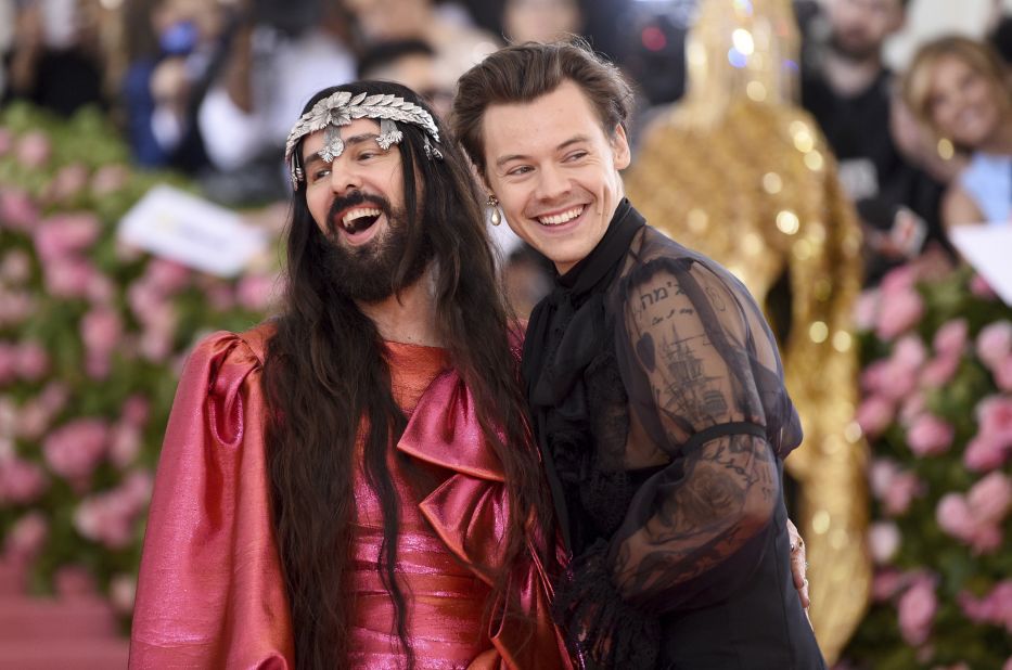 Harry Styles was announced as the face of Gucci's men's tailoring last year, and he continued his role as brand ambassador by donning a black lace jumpsuit by the label. He paired the flamenco-inspired garment with a pearl earring. Described as the "King of Camp" by Met Gala organizers Vogue, the former One Direction star attended as one of the evening's co-hosts. He is pictured with designer Alessandro Michele.