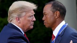 President Donald Trump presents professional golfer and business partner Tiger Woods with the Medal of Freedom during a ceremony in the Rose Garden at the White House May 6, 2019.