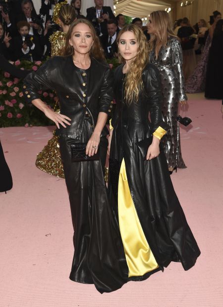 Met Gala regulars Mary Kate and Ashley Olsen arrived in co-ordinated black leather outfits.