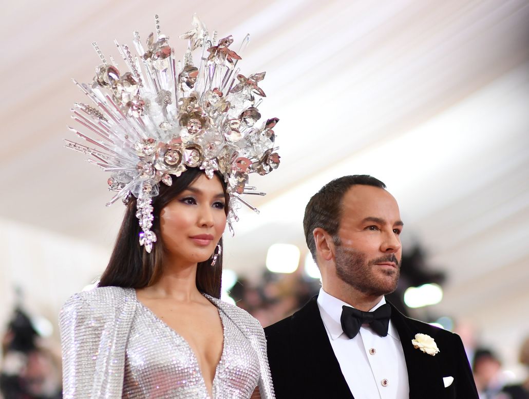 "Crazy Rich Asians" star Gemma Chan poses with Tom Ford, the designer behind her striking embroidered gown with cape and custom headdress.