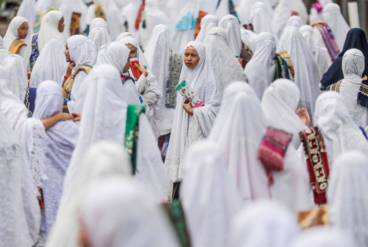 Indonesian students prepare for the afternoon prayer on the first day of Ramadan at Ar-Raudhatul Hasanah Islamic boarding school in Medan, North Sumatra, Indonesia, on Monday.