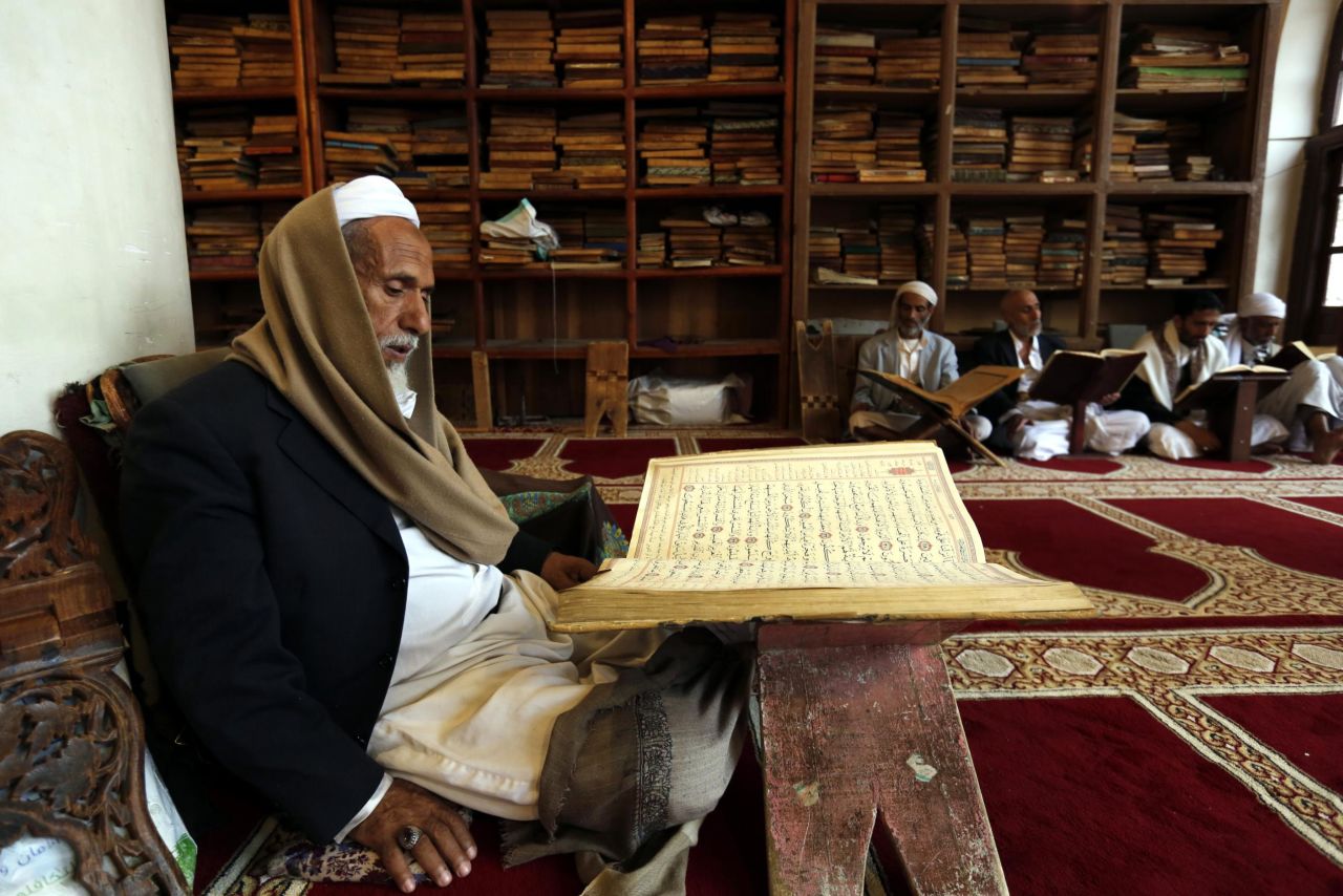 Yemenis read the Koran on the first day of the fasting month of Ramadan at a mosque in Sana'a, Yemen, May 6.