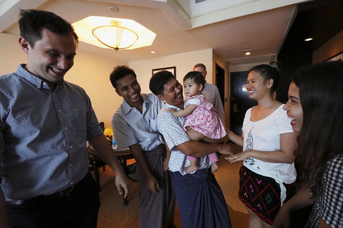 Reuters reporters Wa Lone and Kyaw Soe Oo celebrate with family members after being freed from prison.