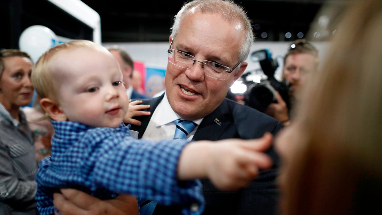 Scott Morrison, Prime Minister of Australia, holds a baby during a Liberal Party Campaign Rally at Launceston Airport on April 18, 2019 in Launceston, Australia. 