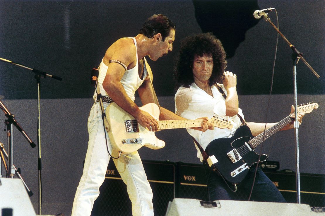 Freddie Mercury and Brian May play Live Aid in 1985.