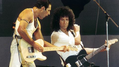 Freddie Mercury and Brian May play Live Aid in 1985.