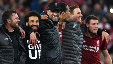 Mohamed Salah and Jurgen Klopp take in the adulation of the fans.