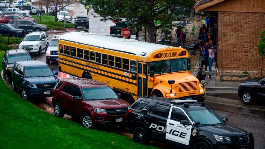 HIGHLANDS RANCH, CO - MAY 07: A bus evacuating students arrives at the Recreation Center at Northridge after at least seven students were injured during a shooting at STEM School Highlands Ranch on May 7, 2019 in Highlands Ranch, Colorado. (Photo by Michael Ciaglo/Getty Images)