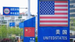Signs with the US flag and Chinese flag are seen at the Qingdao free trade port area in Qingdao in China's eastern Shandong province on May 8, 2019. - China said on May 7 its top trade negotiator will visit the United States for talks with their US counterparts this week even as Washington stepped up pressure with plans to hike tariffs and complaints that Beijing was backtracking on its commitments. (Photo by STR / AFP) / China OUT        (Photo credit should read STR/AFP/Getty Images)
