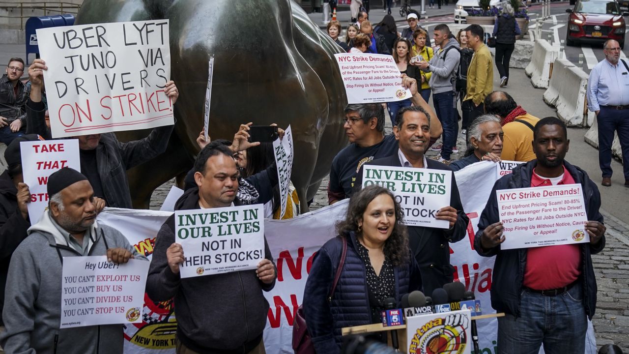 A group of independent drivers and supporters protest against Uber near Wall Street.