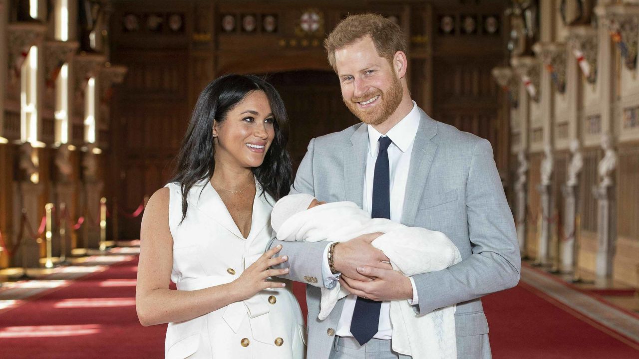 Britain's Prince Harry and Meghan, Duchess of Sussex, hold their newborn son, in St George's Hall at Windsor Castle on Wednesday.