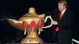 Real estate developer Donald J. Trump rubs a "magic lamp" during the opening ceremony for his huge Taj Mahal casino, in Atlantic city, 05 April 1990. 
Billionaire Donald Trump, who was born in 1946, Queens, New York, has gained notability for his celebrity lifestyle and his real estate successes. / AFP PHOTO / BILL SWERSEY        (Photo credit should read BILL SWERSEY/AFP/Getty Images)