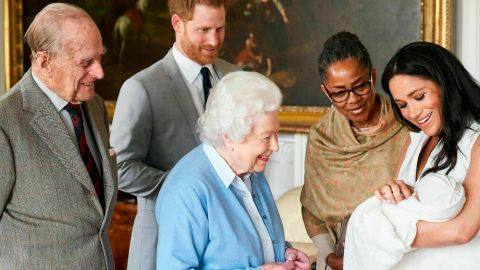 Britain's Prince Harry and Meghan, Duchess of Sussex, joined by her mother Doria Ragland, show their new son to Queen Elizabeth II and Prince Philip at Windsor Castle.