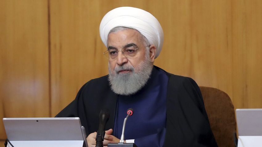 In this photo released by the official website of the office of the Iranian Presidency, President Hassan Rouhani heads a cabinet meeting in Tehran, Iran, Wednesday, May 8, 2019. Rouhani said Wednesday that it will begin keeping its excess uranium and heavy water from its nuclear program, setting a 60-day deadline for new terms to its nuclear deal with world powers before it will resume higher uranium enrichment. (Iranian Presidency Office via AP)