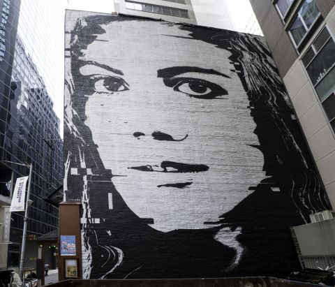 This mural represents the story of Melanie Thompson. She says she was just 12 years old when she was kidnapped and forced into prostitution in New York City. The mural was created by French artist Victor Ash, and can be found at 25 Bridge Street.