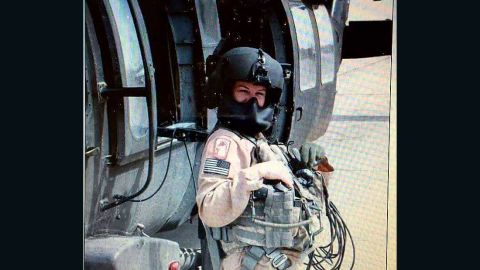 Harmony Allen with a Black Hawk helicopter during her Army training in 1999 at Fort Benning in GA. Allen served in the Army before joining the Air Force in 2000. 