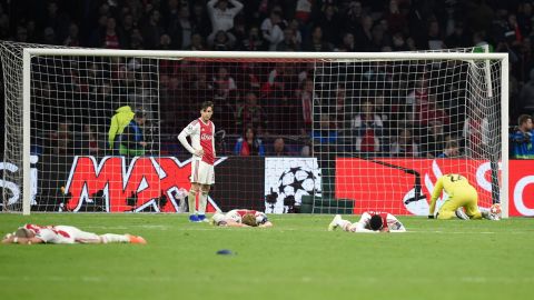 Ajax players react after suffering a dramatic defeat.