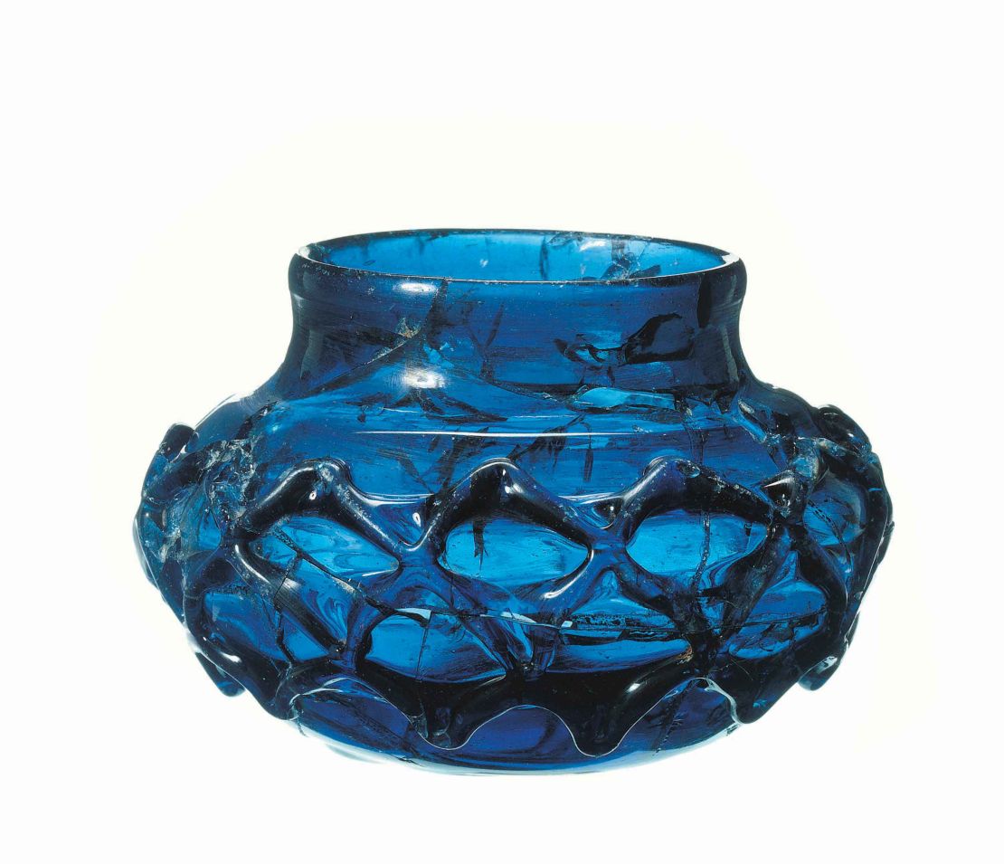 Two rare blue glass decorated beakers were found intact.