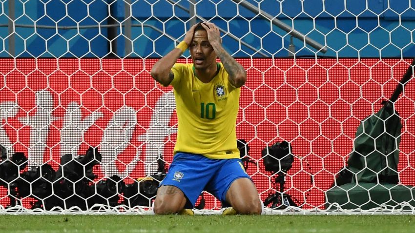 TOPSHOT - Brazil's forward Neymar reacts during the Russia 2018 World Cup quarter-final football match between Brazil and Belgium at the Kazan Arena in Kazan on July 6, 2018. (Photo by Jewel SAMAD / AFP) / RESTRICTED TO EDITORIAL USE - NO MOBILE PUSH ALERTS/DOWNLOADS        (Photo credit should read JEWEL SAMAD/AFP/Getty Images)