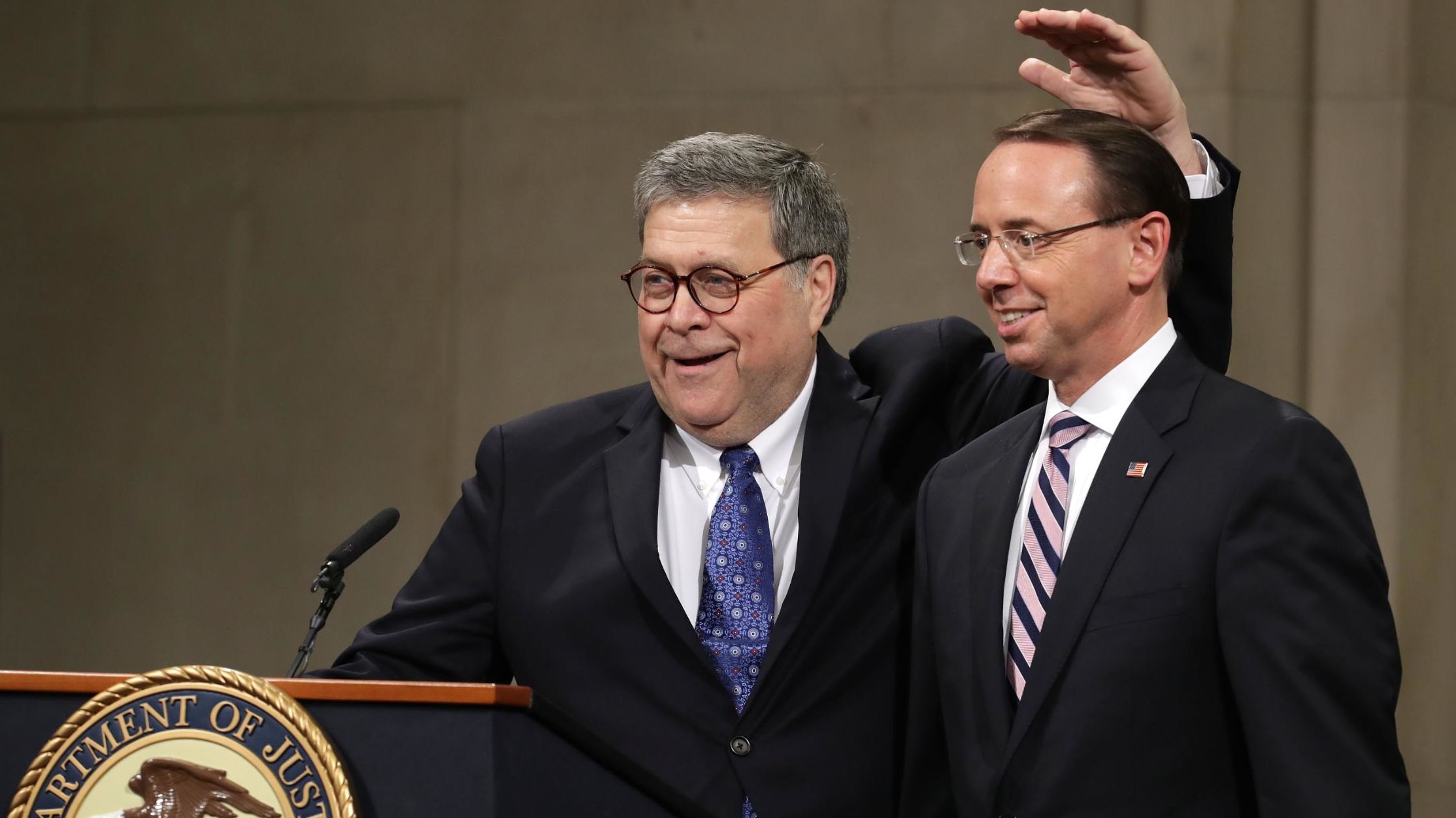 U.S. Attorney General William Barr jokes with Deputy Attorney General Rod Rosenstein on May 09, 2019 in Washington, DC. (Photo by Chip Somodevilla/Getty Images)