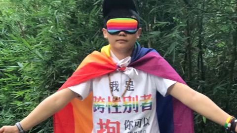Ran, one of the gender non-binary trans people interviewed by Amnesty, uses they/them pronouns. Their T-shirt reads "I am a transgender person, can you hug me?"