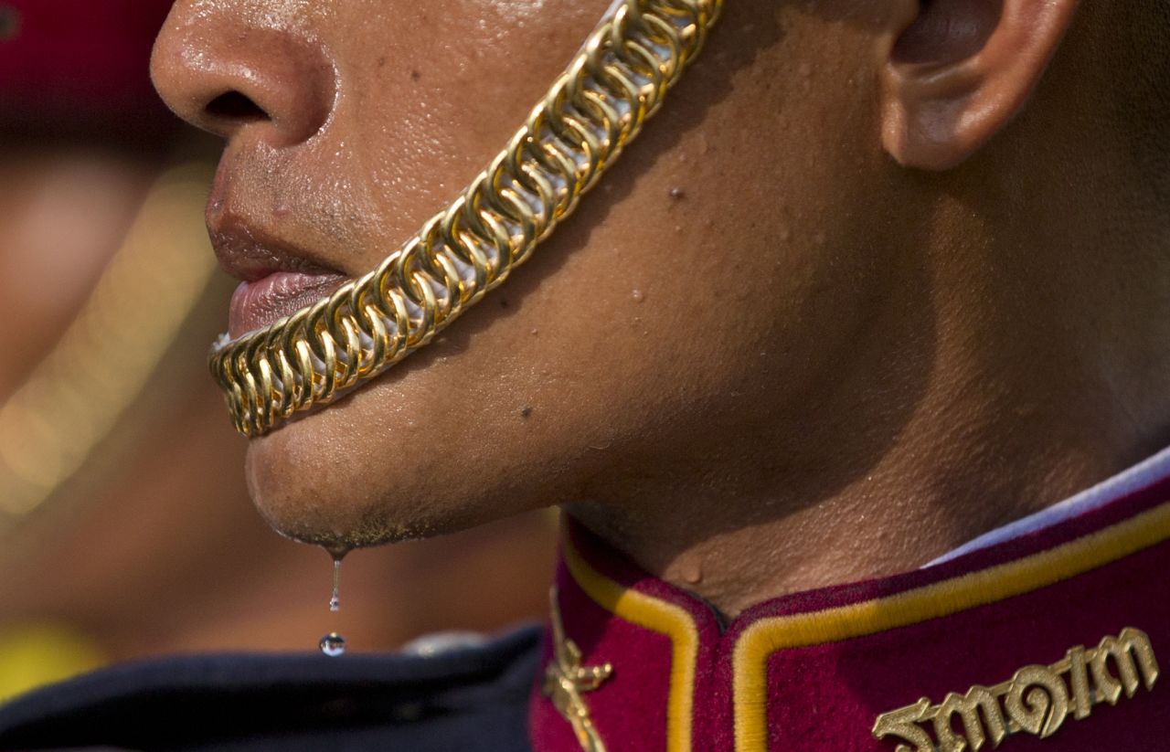 A Thai soldier sweats outside the Suddhaisavarya Prasad Hall in Bangkok on Monday, May 6. Thai King Maha Vajiralongkorn was scheduled to make a public appearance there after he had been <a href="http://www.cnn.com/2019/05/02/asia/gallery/thailand-king-maha-vajiralongkorn/index.html" target="_blank">formally crowned</a> over the weekend.