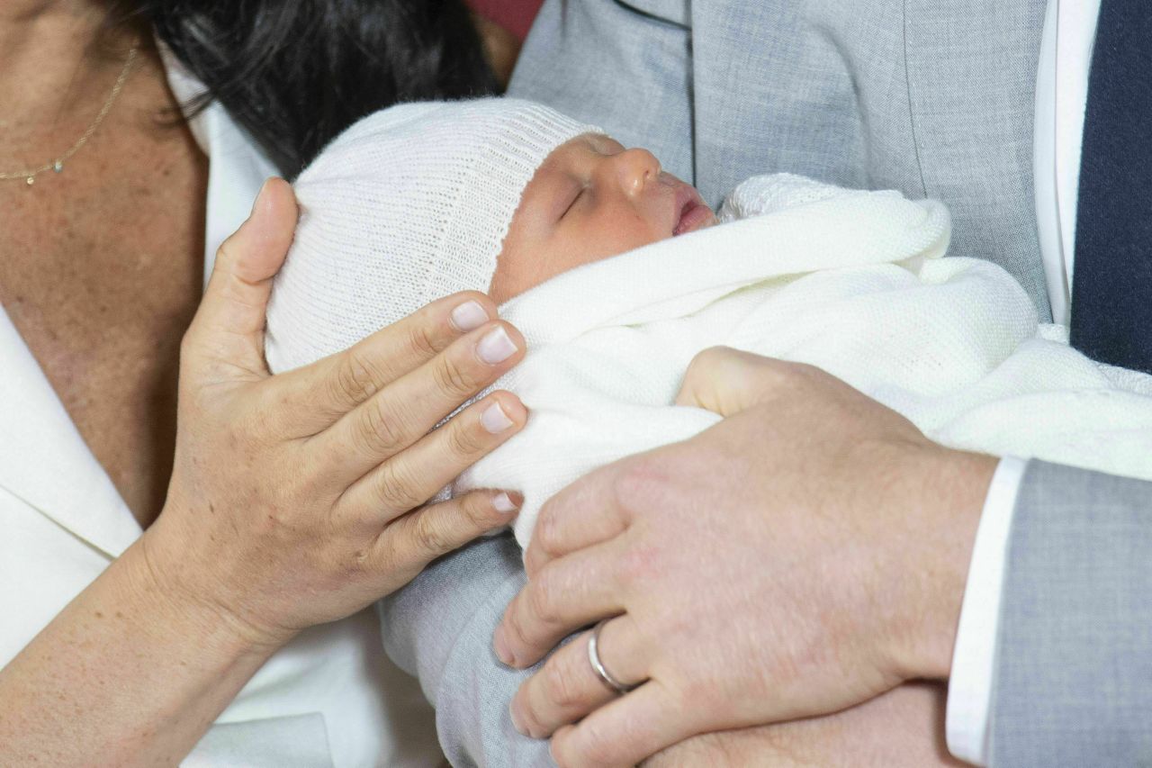 Britain's Prince Harry and his wife Meghan, the Duchess of Sussex, hold <a href="http://www.cnn.com/2019/05/08/uk/gallery/archie-royal-baby-harry-meghan/index.html" target="_blank">their new son, Archie,</a> on Wednesday, May 8. Archie is seventh in line to the throne, just behind his dad.