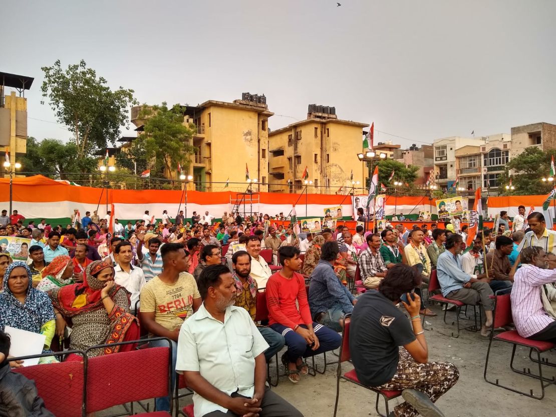 Supporters of the main opposition Congress Party wait for leader Rahul Gandhi's New Delhi rally.