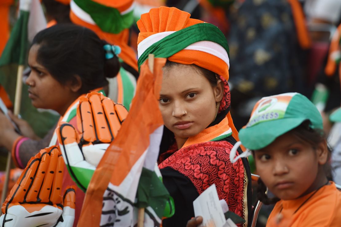 Indian supporters of Congress Party attend a rally addressed by Congress Party President Rahul Gandhi in New Delhi.