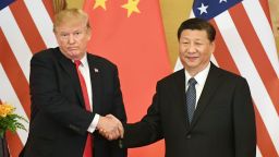 Photo taken in Nov. 9, 2017, shows U.S. President Donald Trump (L) and Chinese President Xi Jinping shaking hands during a joint press conference at the Great Hall of the People in Beijing. (Kyodo)
==Kyodo
(Photo by Kyodo News via Getty Images)