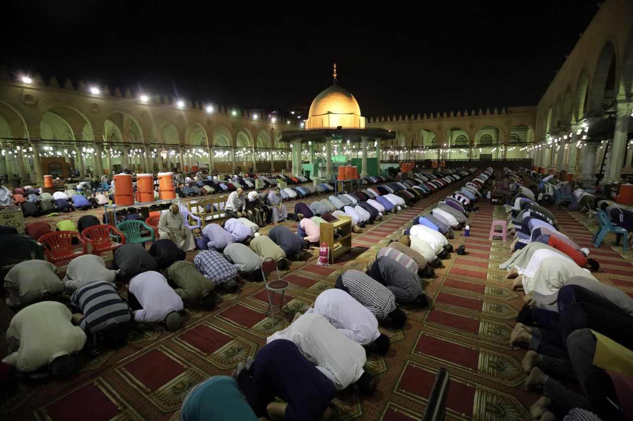 Egyptian Muslims perform "Tarawih" prayer, during the holy fasting month of Ramadan inside Mosque of Amr ibn al-As in Cairo.