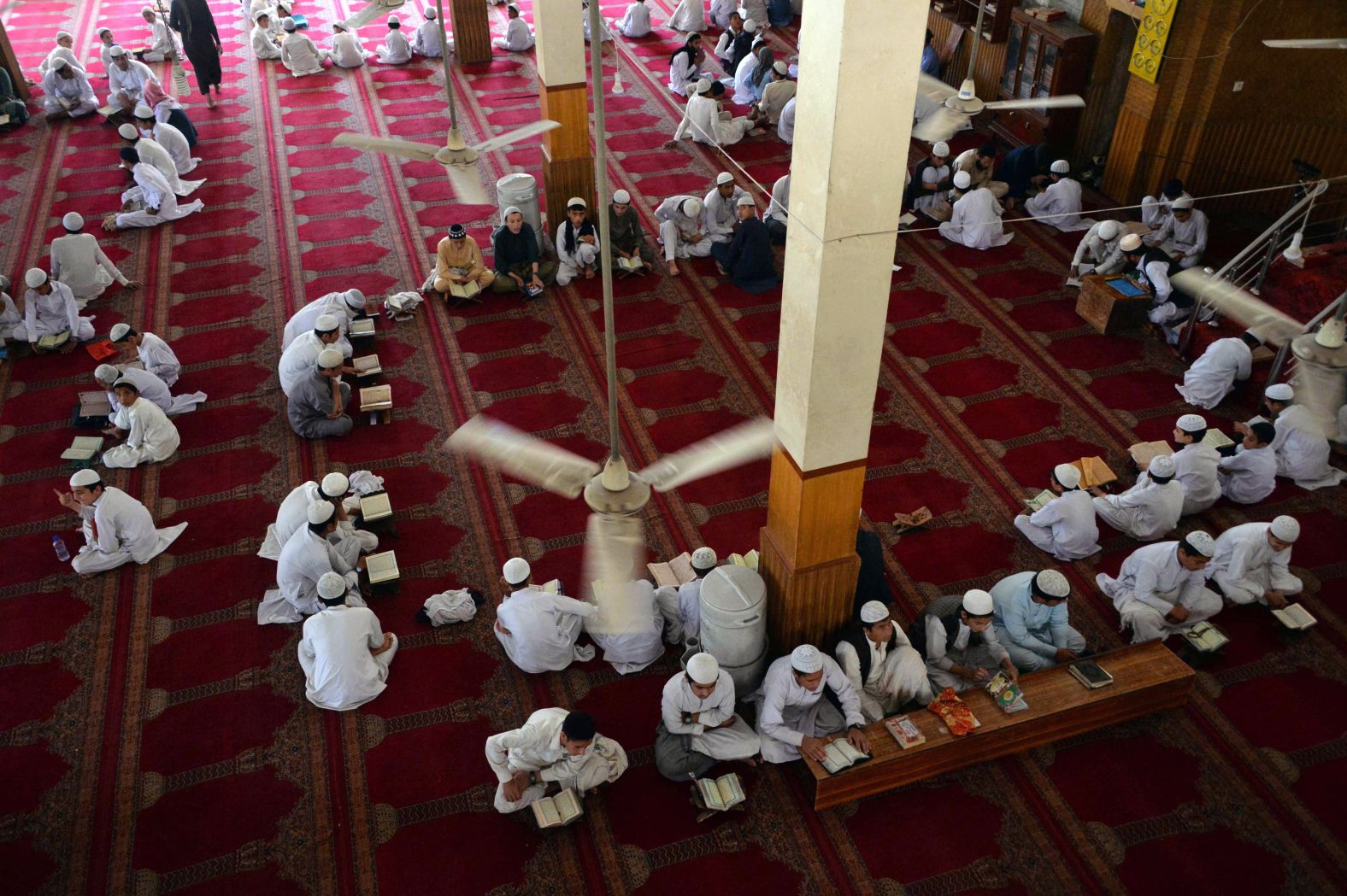 Afghan boys read the Quran at a mosque in Jalalabad.