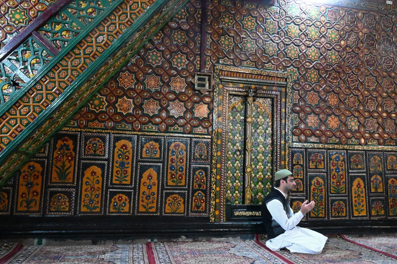 A Kashmiri Muslim prays at the Shah-i-Hamdaan shrine in Srinagar on May 9.