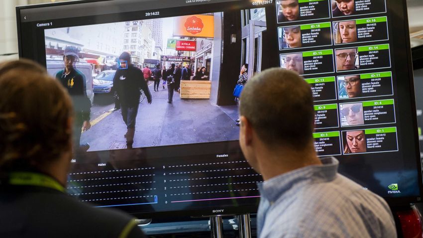 A display shows a facial recognition system for law enforcement during the NVIDIA GPU Technology Conference, which showcases artificial intelligence, deep learning, virtual reality and autonomous machines, in Washington, DC, November 1, 2017. / AFP PHOTO / SAUL LOEB        (Photo credit should read SAUL LOEB/AFP/Getty Images)