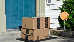 MARYLAND, USA - JUNE 17, 2016: Amazon Prime boxes delivered to the front door of a home. Amazon is the largest Internet-based retailer in the United States. - Image