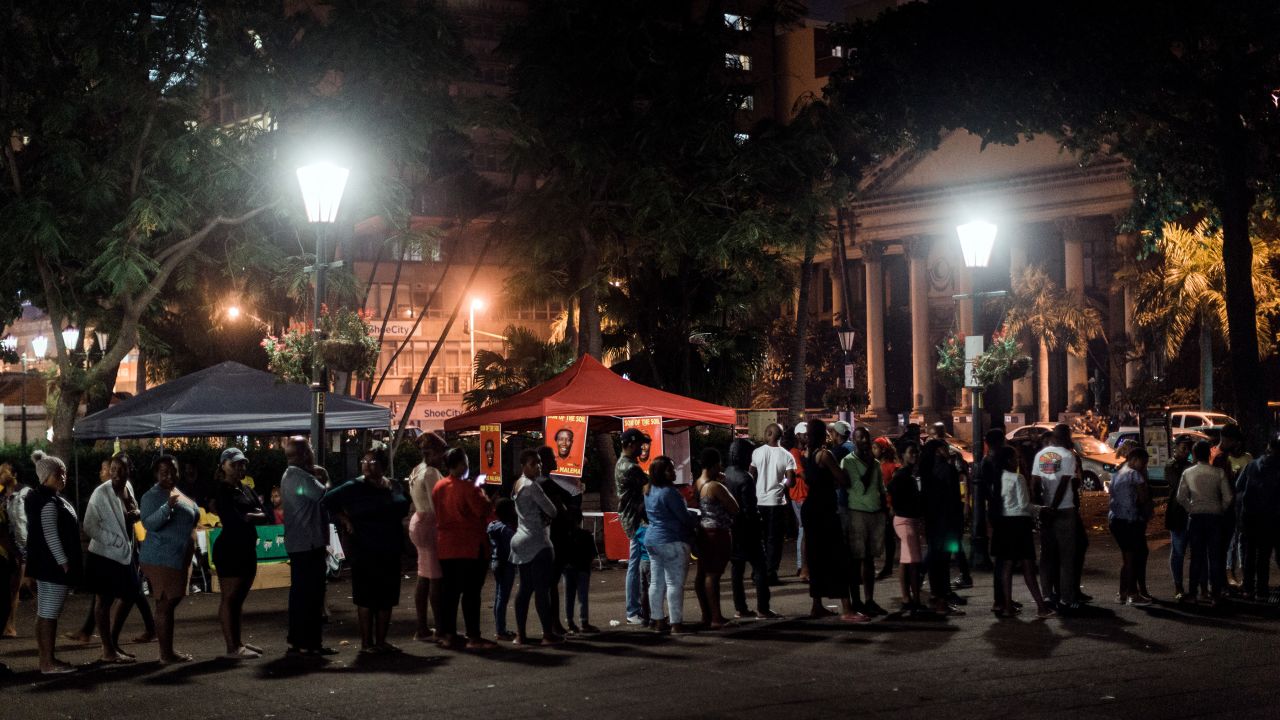 Voters rush to cast their votes hours before polling stations close at the Durban City Hall at the sixth national general elections in Durban on May 8.