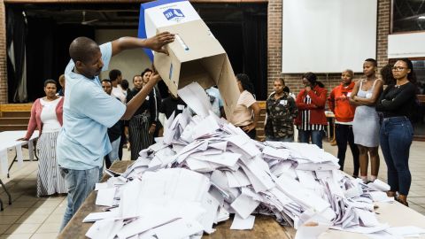 An Independent Electoral Officer (IEC) opens a ballot box as counting begins at the Addington Primary School after voting ended at the sixth national general elections in Durban on Wednesday.