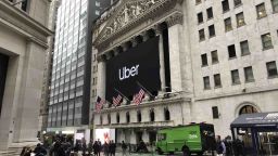 An Uber banner is displayed on the facade of the New York Stock Exchange on Friday, May 10.