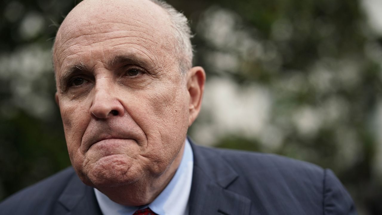 Rudy Giuliani speaks to members of the media at the South Lawn of the White House in 2018.