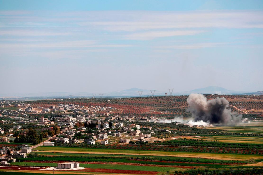 Smoke billows following shelling on the village of Sheikh Mustafa in the Idlib province Saturday. 