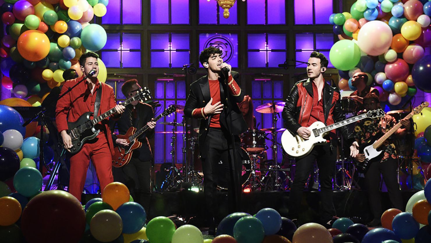 The Jonas Brothers performed their new singles "Sucker" and "Cool" before throwing it back to "Burnin' Up" on "Saturday Night Live."