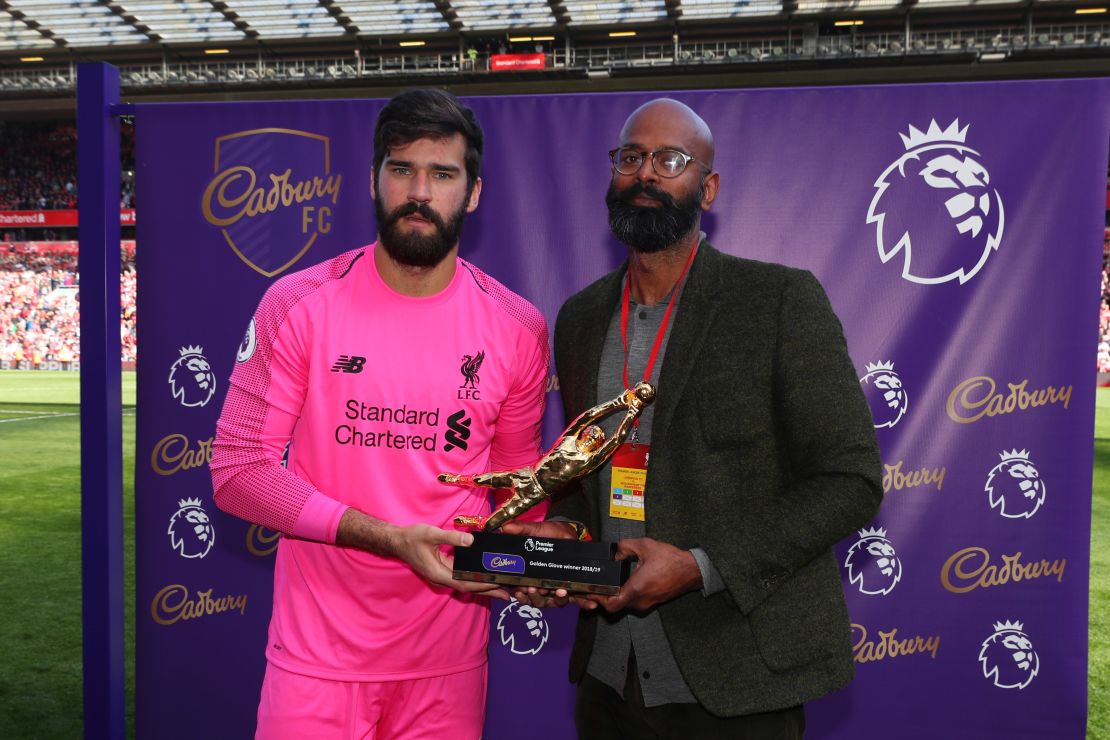 Alisson was handed the Premier League's Golden Glove trophy after the final game of the season.