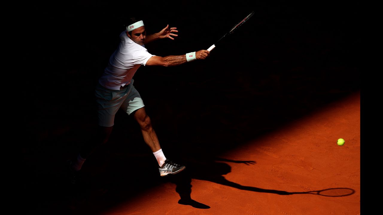 Roger Federer of Switzerland plays a forehand against Gael Monfils of France during Day Six of the Mutua Madrid Open at La Caja Magica on May 9 in Madrid.