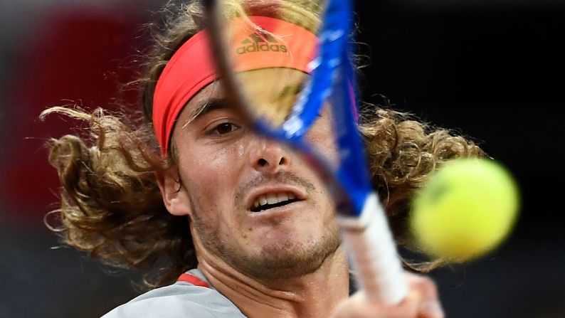 Greece's Stefanos Tsitsipas returns the ball to Spain's Rafael Nadal during their ATP Madrid Open semi-final tennis match at the Caja Magica in Madrid on May 11, 2019. 