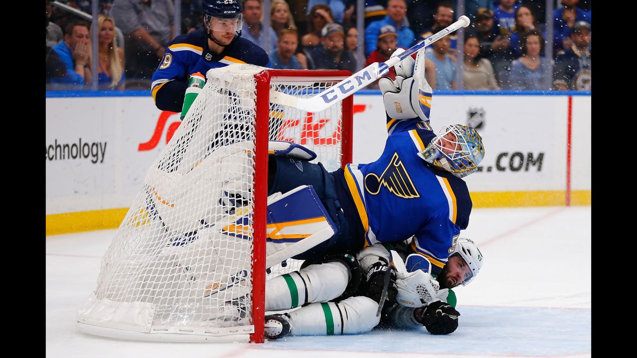 Alexander Radulov #47 of the Dallas Stars crashes into Jordan Binnington #50 of the St. Louis Blues after taking a shot on goal in Game Seven of the Western Conference Second Round during the 2019 NHL Stanley Cup Playoffs at the Enterprise Center on May 7, 2019, in St. Louis, Missouri.