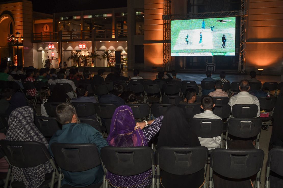 Cricket fans in Karachi come together in a local venue to watch the Asia Cup encounter with India.