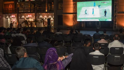 Cricket fans in Karachi come together in a local venue to watch the Asia Cup encounter with India.