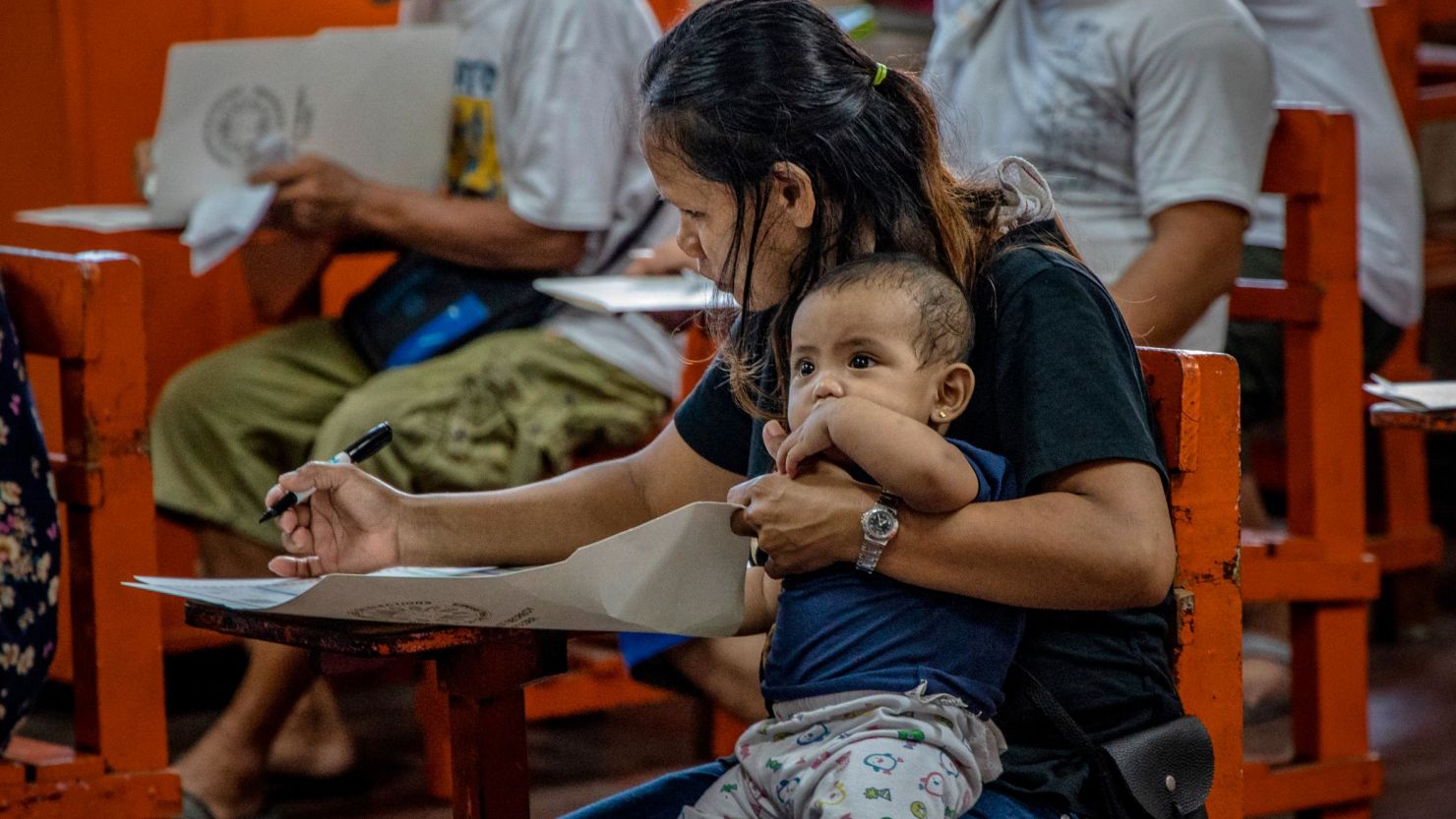 Filipinos cast their votes at a polling precinct in the capital, Manila. The midterm elections are likely a test of President Rodrigo Duterte's popularity.